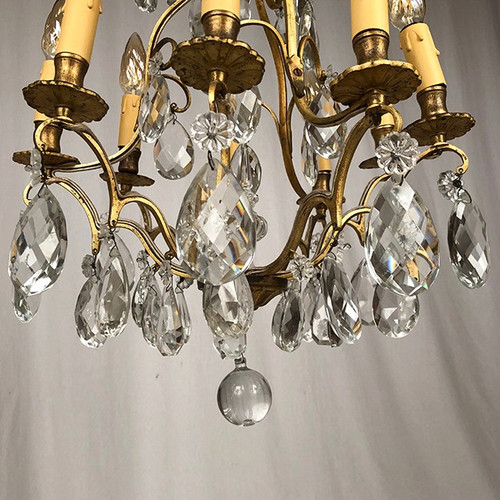 Cage chandelier in gilded brass and glass pendants