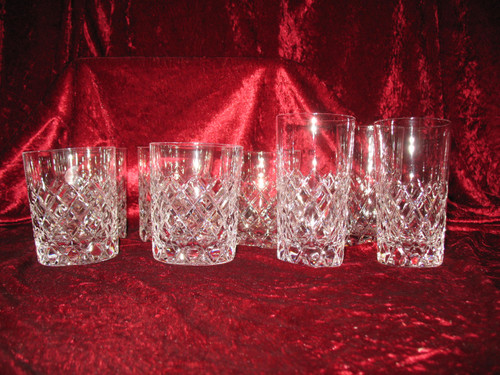 8 cut crystal glasses decorated with lattices on a starry background, 20th century