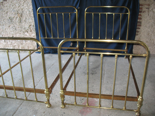 Pair of romantic style brass twin beds, early 20th century