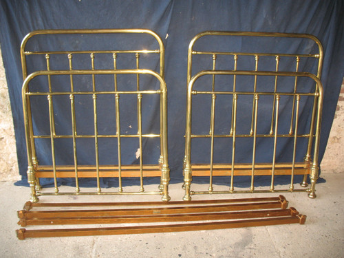 Pair of romantic style brass twin beds, early 20th century