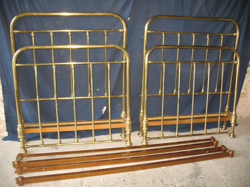 Pair of romantic style brass twin beds, early 20th century