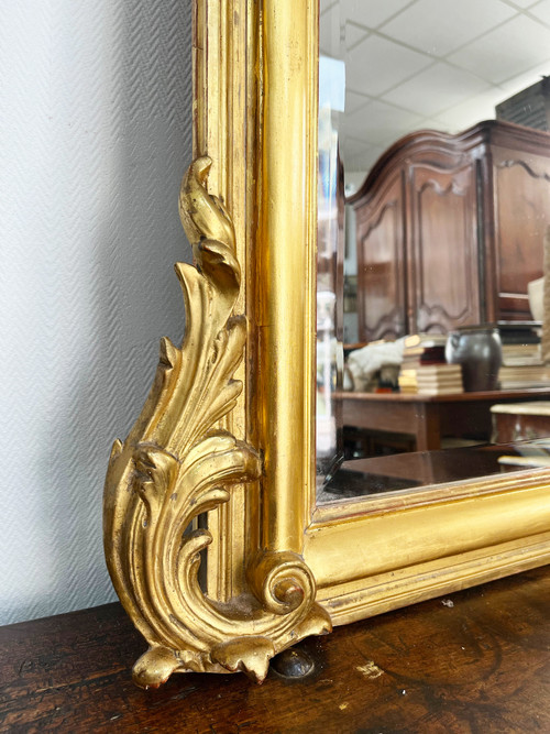 Large gilded mirror from the 19th century in LOUIS XV style