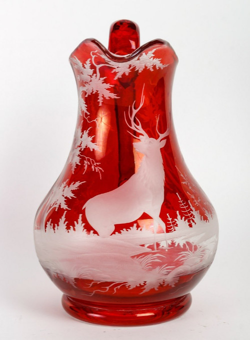 A late 19th century bohemian crystal pitcher