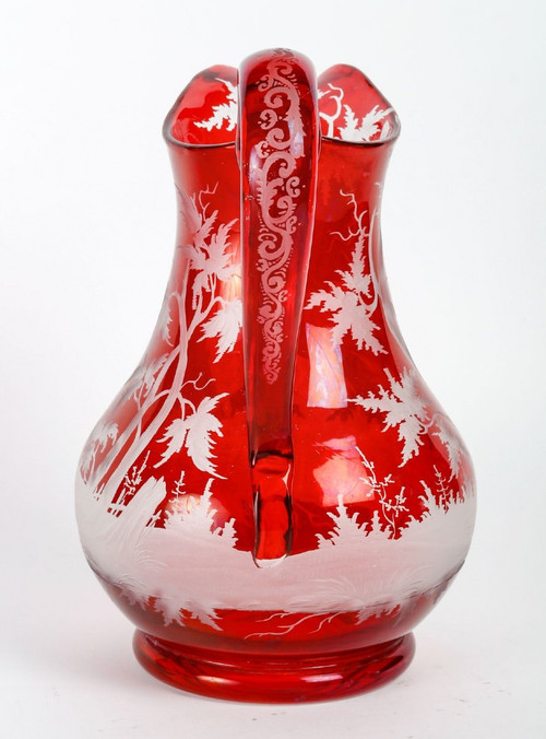 A late 19th century bohemian crystal pitcher