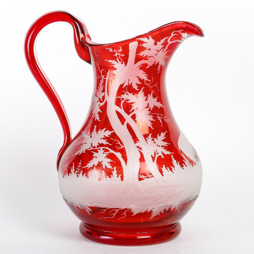 A late 19th century bohemian crystal pitcher