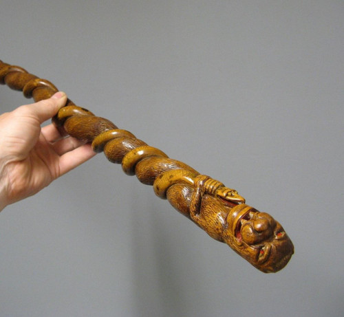 Popular art cane in carved boxwood, 19th century. Adam Island.