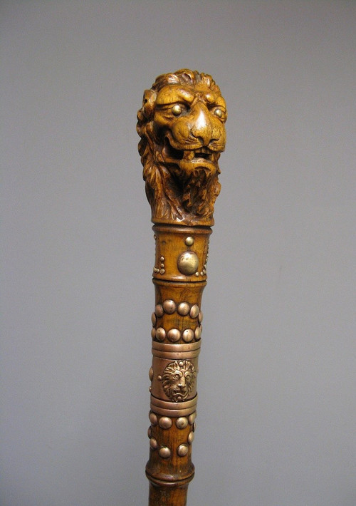 Cane With Handle Representing A Lion's Head.