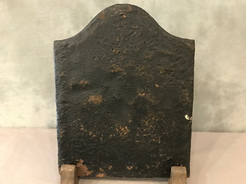 Small antique cast iron fireback from the 18th century