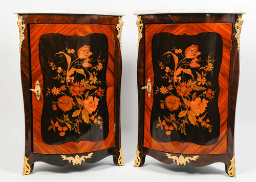 a pair of late 19th century marquetry corner cabinets