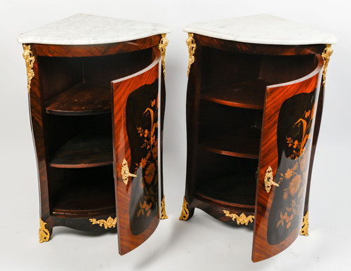 a pair of late 19th century marquetry corner cabinets