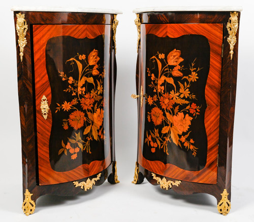 a pair of late 19th century marquetry corner cabinets