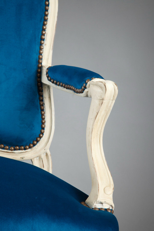 Four peacock blue velvet armchairs from the Louis XV period