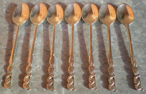 7 mocha/espresso spoons in solid silver, Egyptian decor