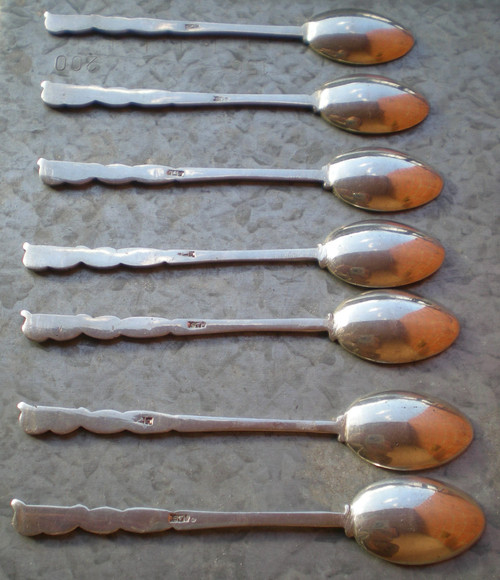 7 mocha/espresso spoons in solid silver, Egyptian decor