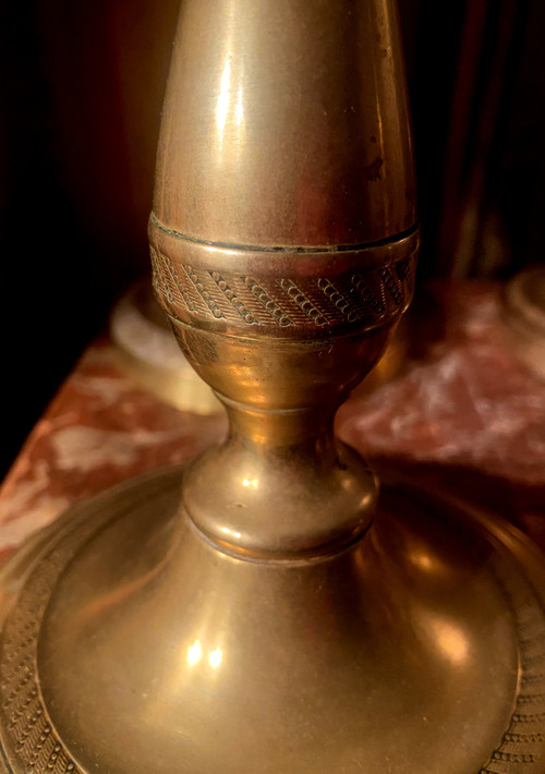 Two pairs of elegant Restoration-period polished bronze guilloche candlesticks