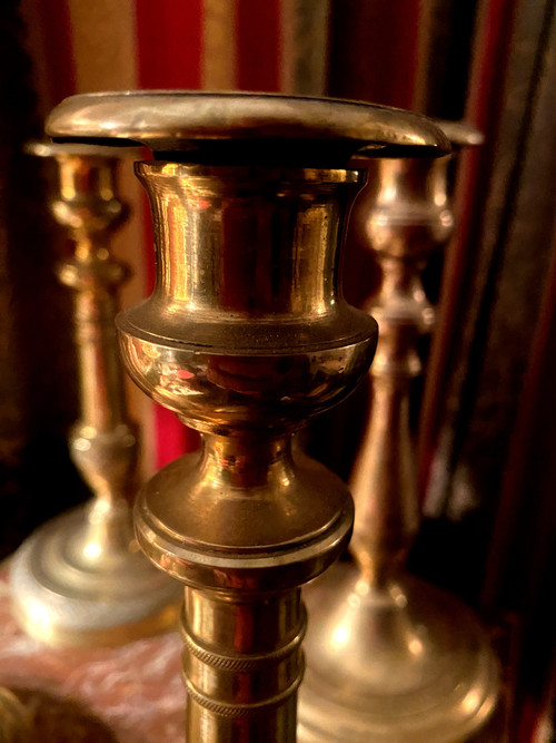 Two pairs of elegant Restoration-period polished bronze guilloche candlesticks