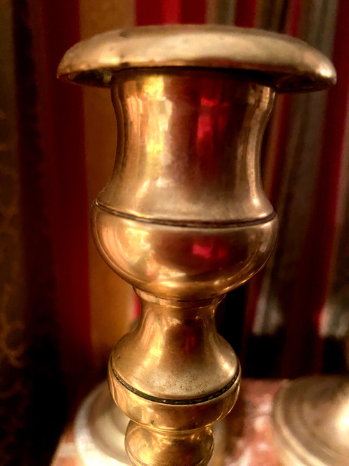 Two pairs of elegant Restoration-period polished bronze guilloche candlesticks