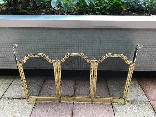 Large old fireplace fire screen in worked brass from the 19th century