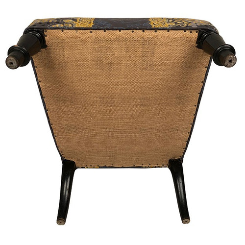 Low chair with moving backrest, blackened wooden legs. Napoleon III period