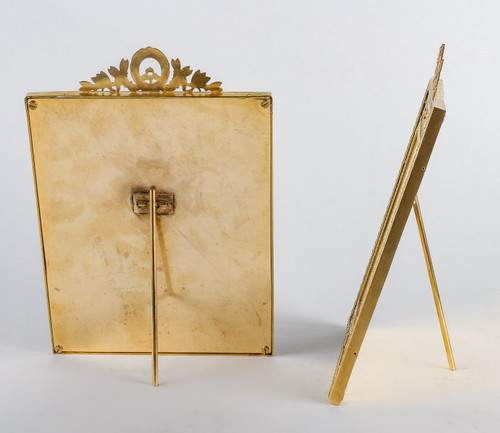 A pair of late 19th century gilded bronze photo frames