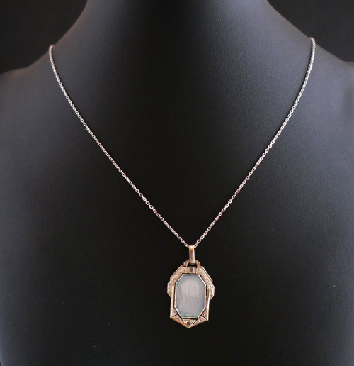 Art Deco Medal, Mother-of-Pearl Virgin, Rose-Cut Diamonds with chain.