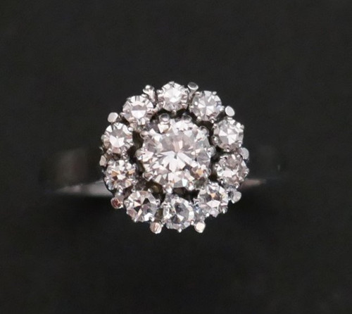 Marguerite ring, 1 carat diamonds, 18-carat white gold.