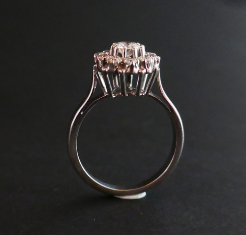 Marguerite ring, 1 carat diamonds, 18-carat white gold.