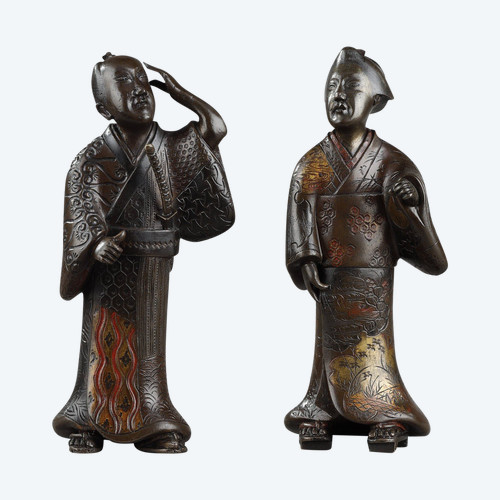 Due figure in bronzo rappresentanti una Geisha e un samurai