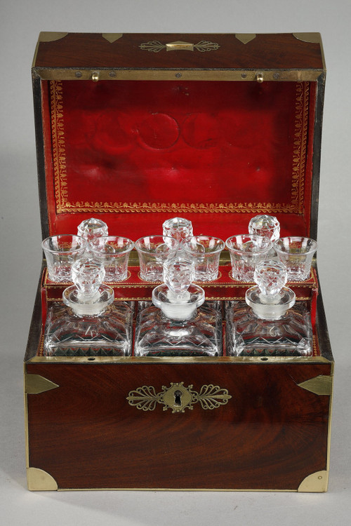 FLAMED MAHOGANY LIQUEUR CELLAR WITH CUT CRYSTAL BOTTLES AND GLASSES