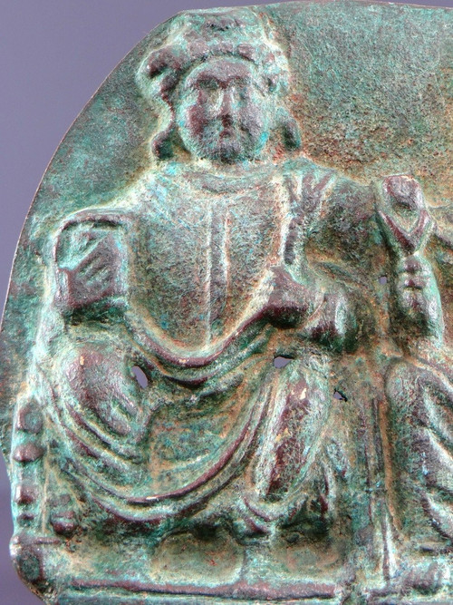 Gandhara, I-III secolo, grande placca di bronzo decorata in rilievo con Panchika e Hariti.