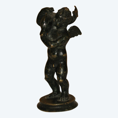 Bronze sculpture of the cherub and the dolphin in the Grand Tour style from the 20th century.