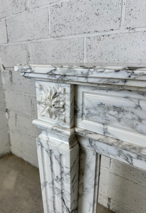 White marble mantel in the Louis XVI style