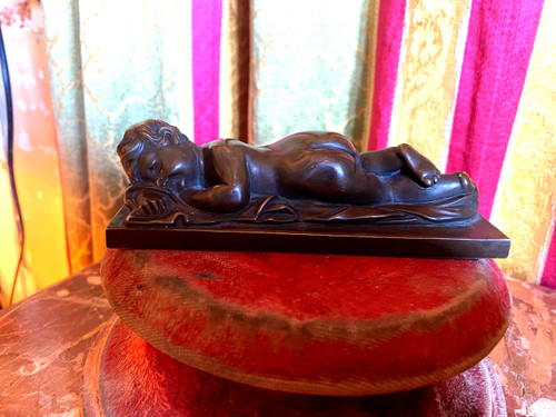 Very fine bronze patina medal of a "Putto", nude sleeping on a sheet from the 19th century