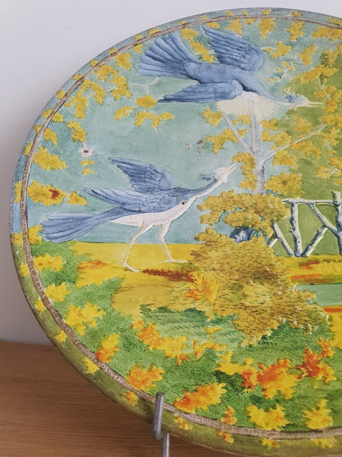 Piatto decorativo, coppia di aironi cenerini, ceramica smaltata, Art Nouveau, inizio XX°.