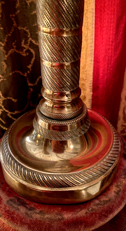 Very beautiful pair of First Empire period candlesticks in guilloché polished bronze called columnar