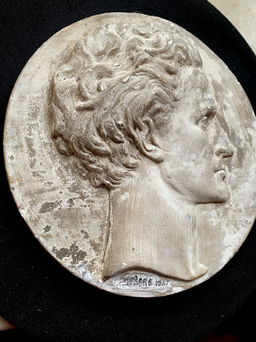 Profile of a man's head in plaster medallion from the Napoleon IIII period signed (Falguière label 1867)