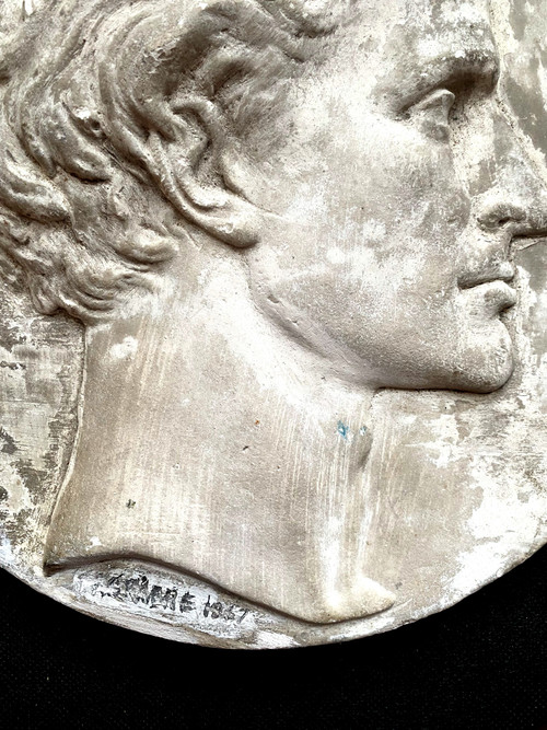 Profile of a man's head in plaster medallion from the Napoleon IIII period signed (Falguière label 1867)