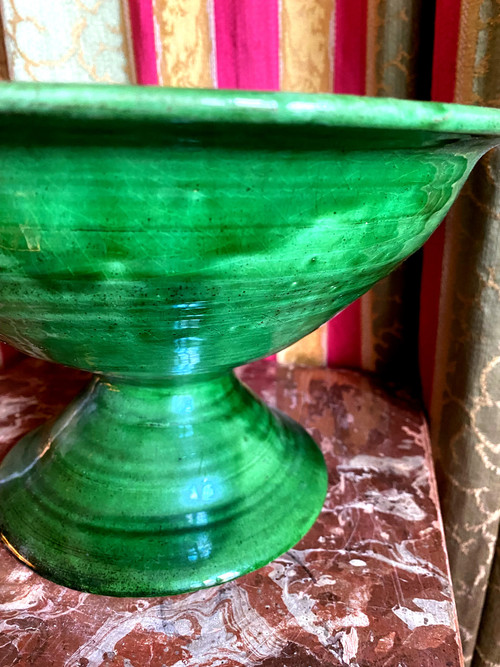 Generous raw green enameled Uzès earthenware bowl on pedestal from the end of the 19th century