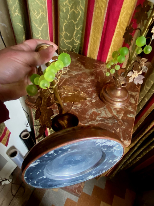 Pair of 19th century gilded copper candlesticks with glass paste grape clusters and vine leaves on shower stand