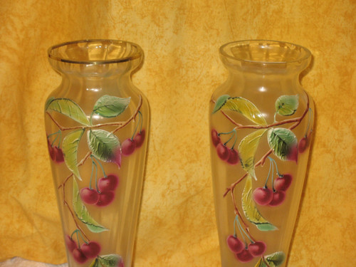 Pair of enameled glass vases decorated with cherries, early 20th century