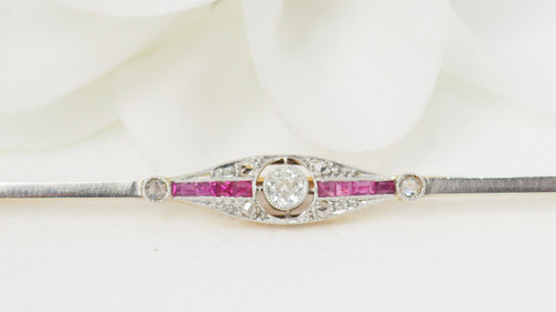 Yellow gold ruby and diamond barrette brooch