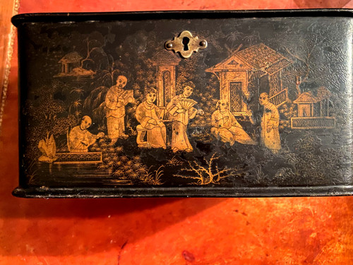 Black boiled cardboard tea box finely decorated with animated scenes in gold with two zinc compartments from the Napoleon III period