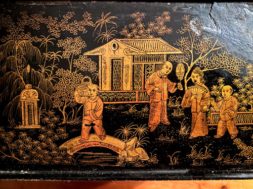 Black boiled cardboard tea box finely decorated with animated scenes in gold with two zinc compartments from the Napoleon III period