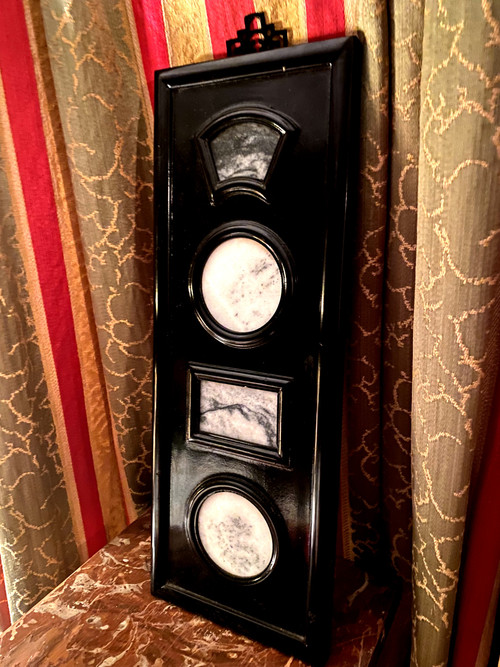 Chinese decorative panel with implications of different veined marbles with frames integrated into a decorative rectangular panel to hang