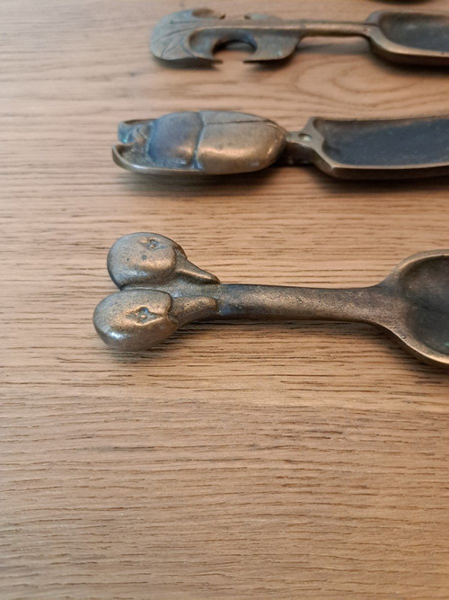 Suite Of Four Cosmetic Spoons, Bronze, 20th Century.