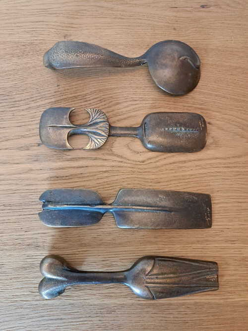 Suite Of Four Cosmetic Spoons, Bronze, 20th Century.