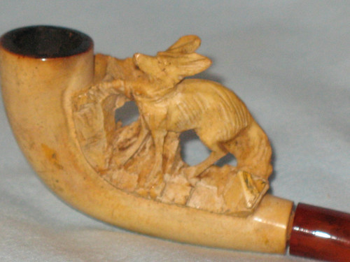 Meerschaum and amber pipe in its original case depicting a fox from the 19th century.