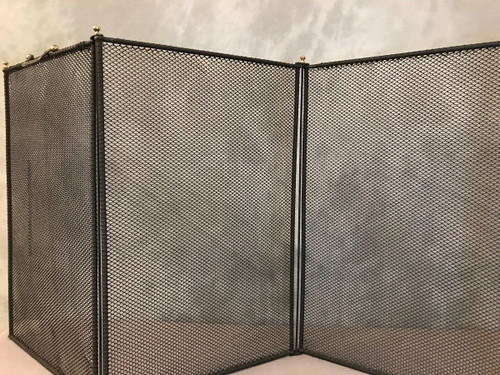 Old fireplace screen in blackened iron from the 19th century