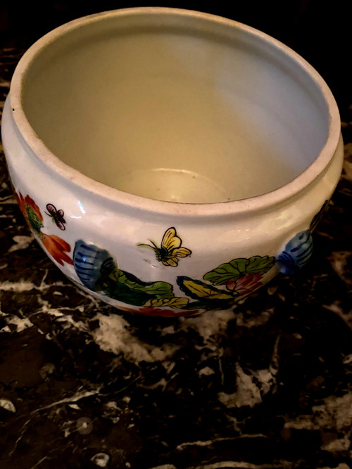 Ornamental Chinese porcelain ginger pot decorated with Lotus flowers, foliage and birds.