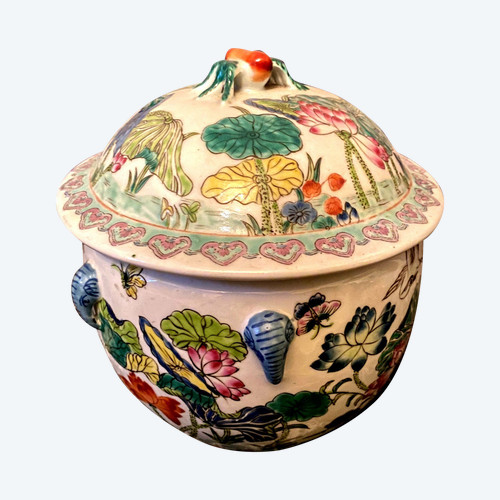 Ornamental Chinese porcelain ginger pot decorated with Lotus flowers, foliage and birds.